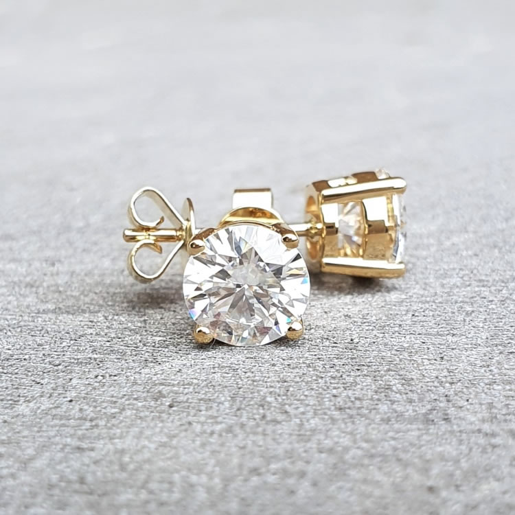 Studs. Beautiful Solid gold 5.0mm 1ct Moissanite studs