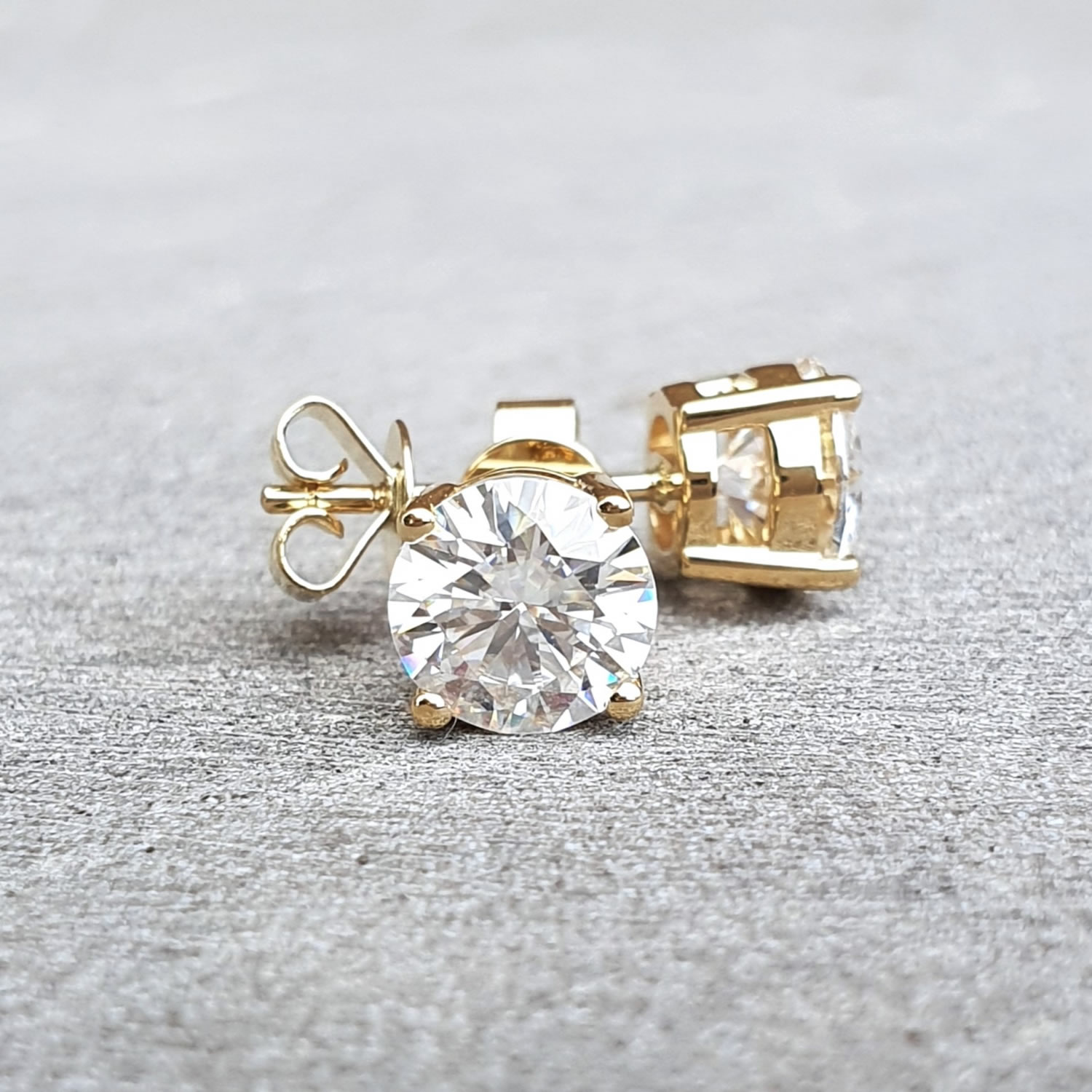 0.46 CTW DEW Round Forever One Moissanite Solitaire Stud Earrings 14K  Yellow Gold | Charles & Colvard