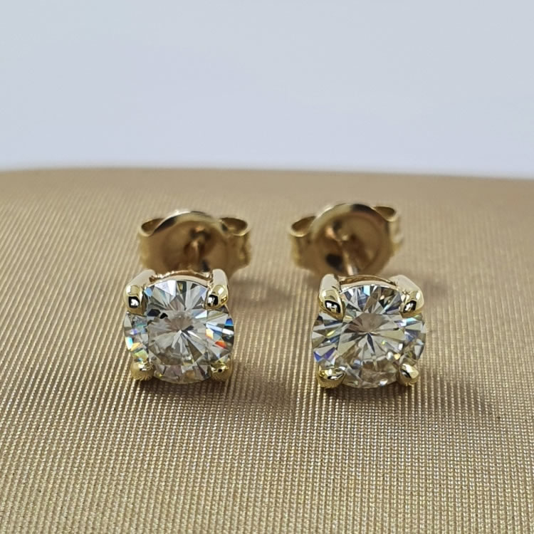 Studs. Beautiful Solid gold 5.0mm, 1ct Moissanite studs